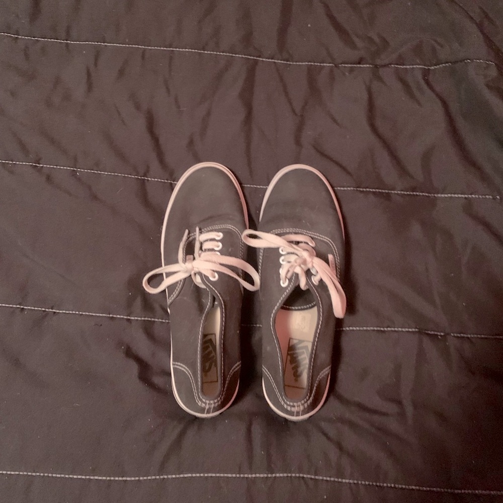 Black Vans shoes.